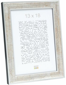 S40JE9 A silver coloured wooden photo frame with a dark...