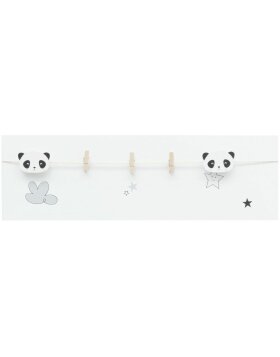 White Wooden Wall with Clothespins and Panda Pattern...